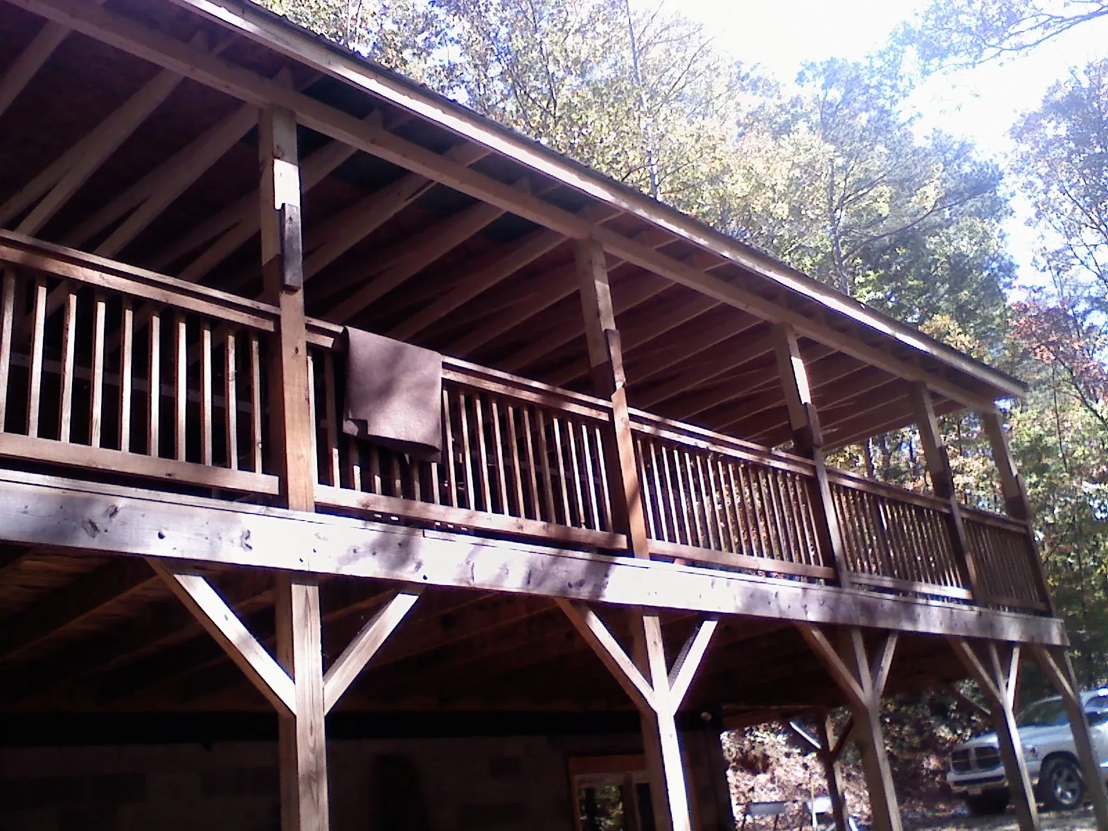 Timber framing under a new elevated porch and deck — Roof Leak Repair in Poplar Grove by Roofing Brothers